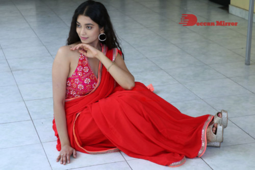 Telugu Actress Digangana Suryavanshi in a red saree