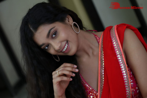 Telugu Actress Digangana Suryavanshi in a red saree