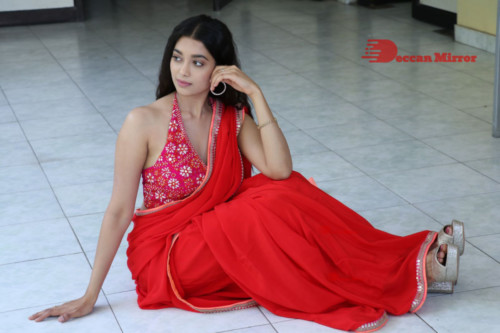 Telugu Actress Digangana Suryavanshi in a red saree