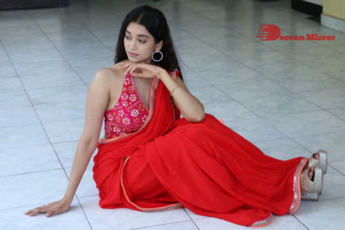 Telugu Actress Digangana Suryavanshi in a red saree