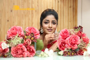 Dimple Hayathi in a red dress with white dots