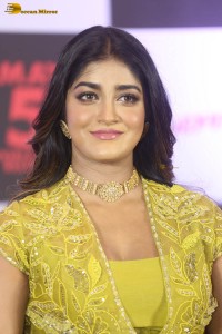 actress dimple hayathi in a yellow dress at a movie function