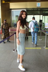 actress Disha Patani red-hot looks in a green top and denim jeans
