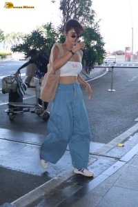 bollywood actress Disha Patani scorching hot looks in a white top at mumbai airport