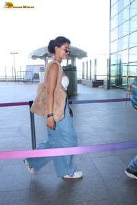 bollywood actress Disha Patani scorching hot looks in a white top at mumbai airport