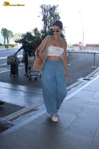 bollywood actress Disha Patani scorching hot looks in a white top at mumbai airport