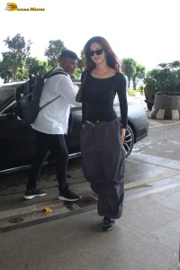 bollywood actress Disha Patani pretty in a black top at mumbai airport