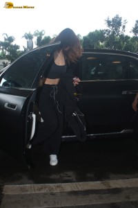 bollywood actress Disha Patani sexy in a black top at mumbai airport