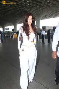 bollywood actress Disha Patani sizzling in white dress at mumbai airport