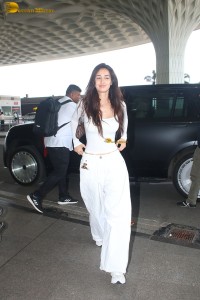 bollywood actress Disha Patani sizzling in white dress at mumbai airport