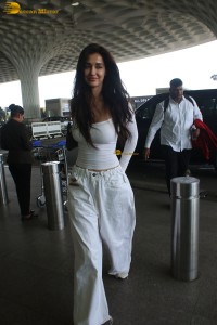 bollywood actress Disha Patani sizzling in white dress at mumbai airport
