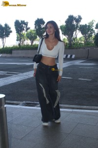 bollywood actress disha patani in a white top at mumbai airport