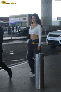 bollywood actress disha patani in a white top at mumbai airport
