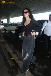 actress disha patani chic look in black top and sunglasses