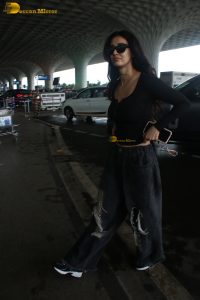 actress disha patani chic look in black top and sunglasses