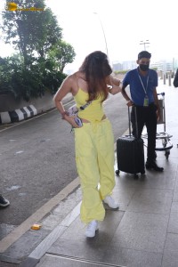 actress Disha Patani red-hot in a green noodle strap top