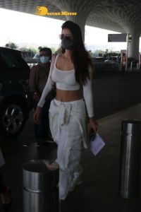 Disha Patani dressed in white at the Mumbai Airport