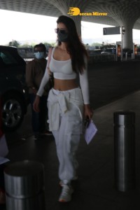 Disha Patani dressed in white at the Mumbai Airport