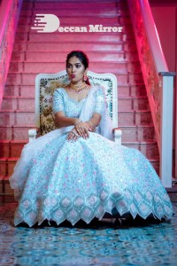 Divi Vadthya in a white lehenga choli dress