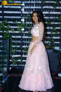 Divi Vadthya in a pink dress