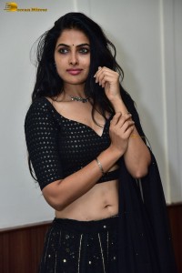 actress divi vadthya in a black lehenga choli dress