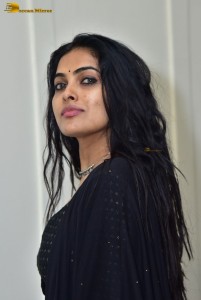 actress divi vadthya in a black lehenga choli dress