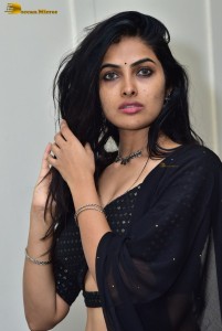 actress divi vadthya in a black lehenga choli dress