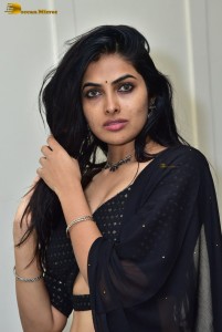 actress divi vadthya in a black lehenga choli dress