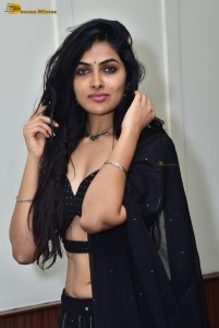 actress divi vadthya in a black lehenga choli dress