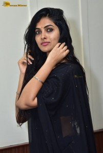 actress divi vadthya in a black lehenga choli dress