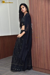 actress divi vadthya in a black lehenga choli dress