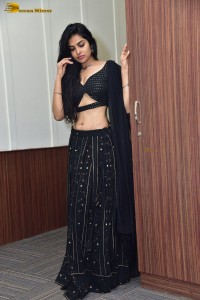 actress divi vadthya in a black lehenga choli dress