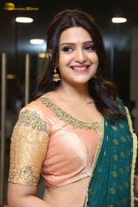 Actress Telugu Actress Divya Pillai in a light pink lehenga choli dress