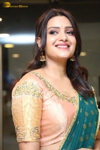 Actress Telugu Actress Divya Pillai in a light pink lehenga choli dress
