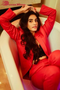 Actress Divyansha Kaushik in a Red Pant Suit
