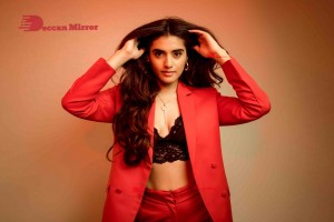 Actress Divyansha Kaushik in a Red Pant Suit