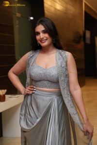actress divyansha kaushik in a low neck dress at a movie function