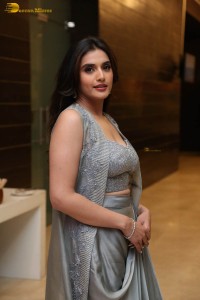 actress divyansha kaushik in a low neck dress at a movie function