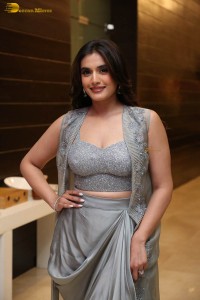 actress divyansha kaushik in a low neck dress at a movie function