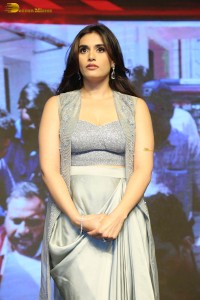 actress divyansha kaushik in a low neck dress at a movie function