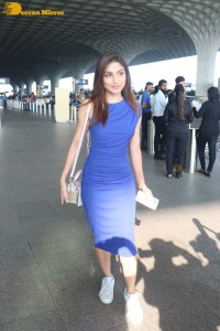 Actress Donal Bisht in a blue dress at mumbai airport on october 21