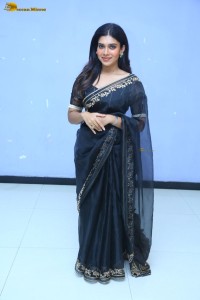 actress dushara vijayan sweet looks in a dark saree
