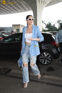 actress Elnaaz Norouzi gorgeous in a blue jacket and jeans