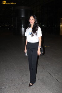 model and actress esha gupta seen in a white top