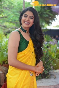 Actress Faria Abdullah in a Yellow Saree and a Green Blouse