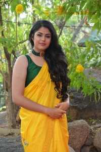Actress Faria Abdullah in a Yellow Saree and a Green Blouse