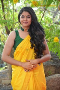 Actress Faria Abdullah in a Yellow Saree and a Green Blouse