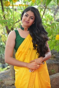 Actress Faria Abdullah in a Yellow Saree and a Green Blouse