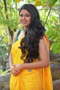 Actress Faria Abdullah in a Yellow Saree and a Green Blouse