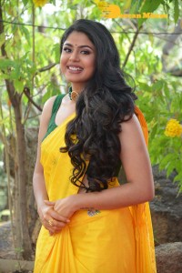 Actress Faria Abdullah in a Yellow Saree and a Green Blouse